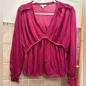 Lucky Brand women’s long sleeve empire-waist top in Magenta.